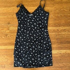 Black min dress with white floral design size medium
